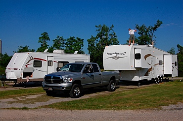 NuWa Hitchhiker fifth wheel and Fleetwood Lynx travel trailer