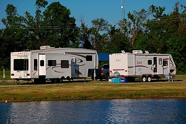 NuWa Hitchhiker fifth wheel and Fleetwood Lynx travel trailer