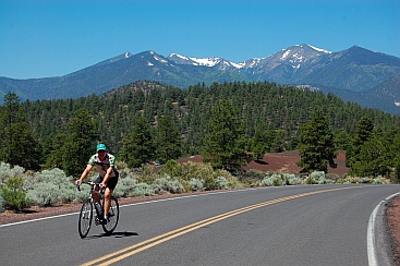 Bicycling near San Francisco Peaks near Bonito Campground at Sunset Crater outside Flagstaff, Arizona