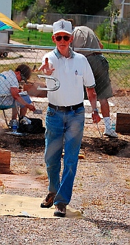 Old folks playing horse shoes at Iron Country Fair, Parowan, Utah