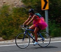 Male bicyclist in a ballerina tutu