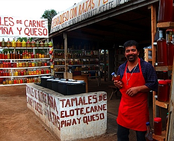 Buying honey at a roadside stand