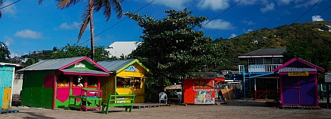 Little shops in Clifton Harbor town square Union Island SVG Grenadines