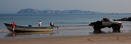 Towing a panga up on the beach at Bahia de Chamela