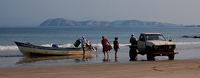Fishermen unload their catch in Chamela Bay.