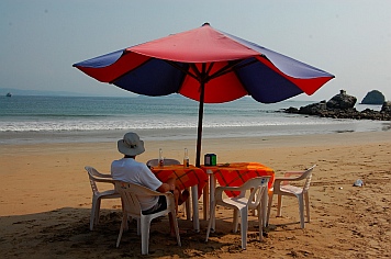 Beers under a beach umbrella at Bahia de Chamela.