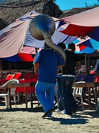 Tuba player on La Boquita Beach, Santiago Bay, Manzanillo, Colima, Mexico
