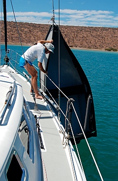 Porta-bote is lowered into the water.