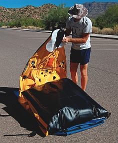 Putting away the Hobie i14t inflatable tandem kayak - fold the stern over everything