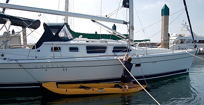 The kayak makes a good platform for waxing the hull.