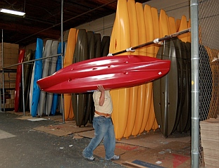 New kayaks lined up ready to sell