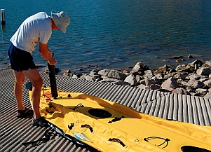 Pumping up a Hobie i14t inflatable tandem kayak 