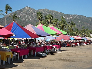 Colorful beach umbrellas, Playa La Boquita, Santiago, Mexico