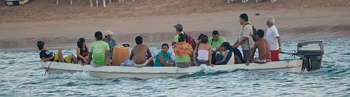 Workers take a water shuttle home from Ixtapa Island, Mexico.