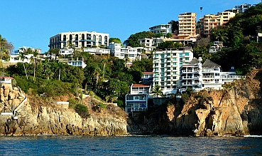 Villas and hotels line Boca Chica Channel.