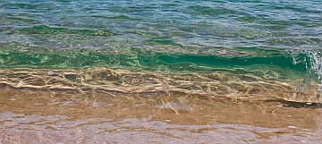 Jewel like waves at Playa Chachacual in Bays of Huatulco, Mexico