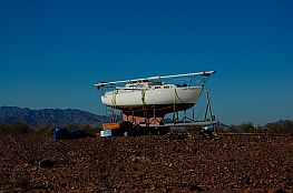 A rare boondocker in a boat in Quartzsite, Arizona