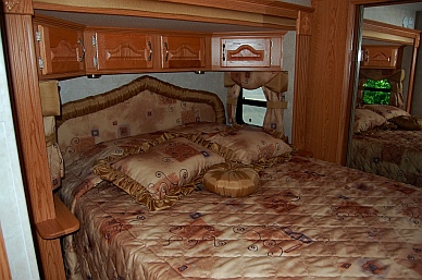 Our fulltime RV is a Hitchhiker 34.5 II RLTG with a queen bed in the slideout